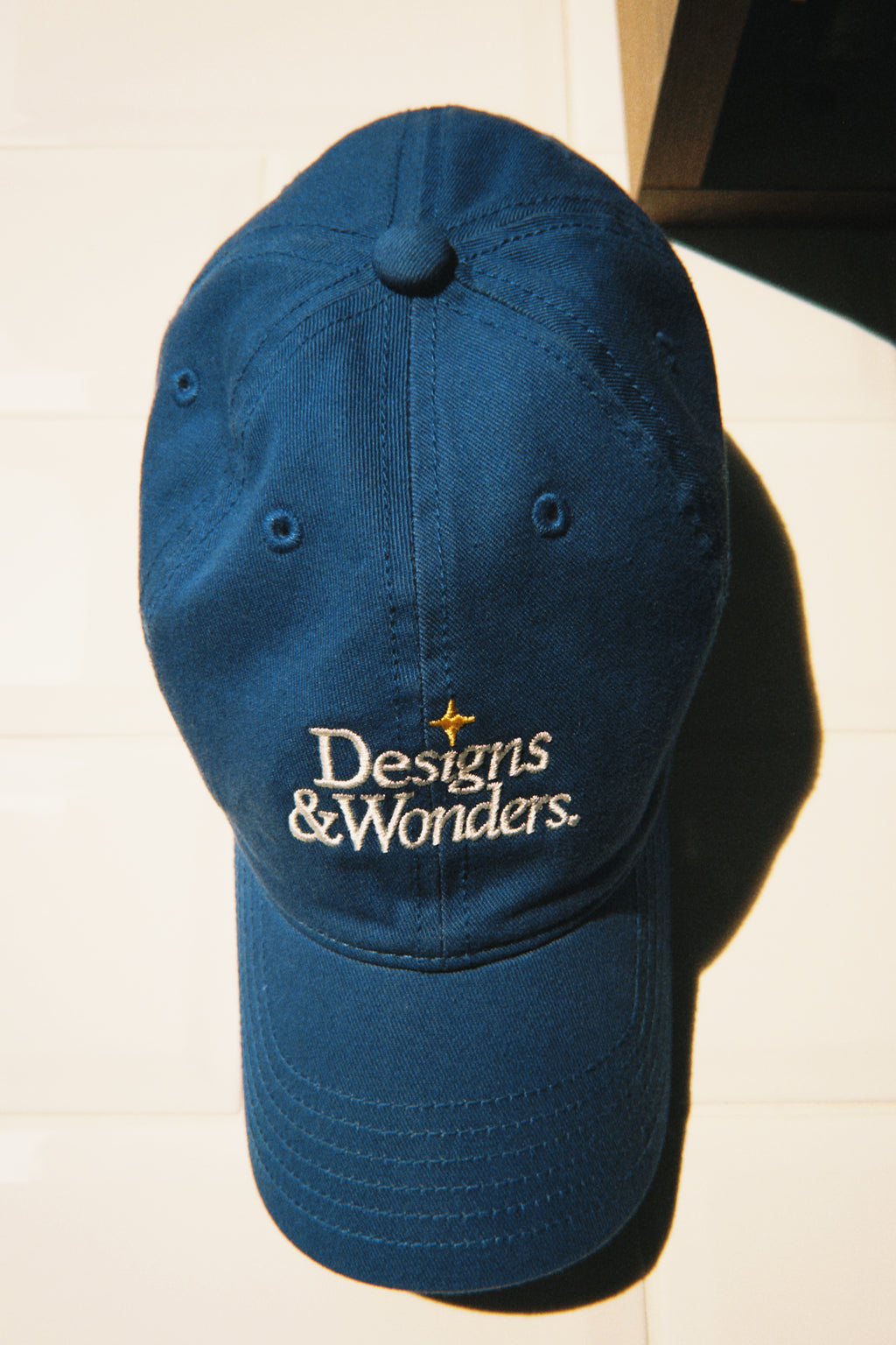 Designs & Wonders Cap: Blue