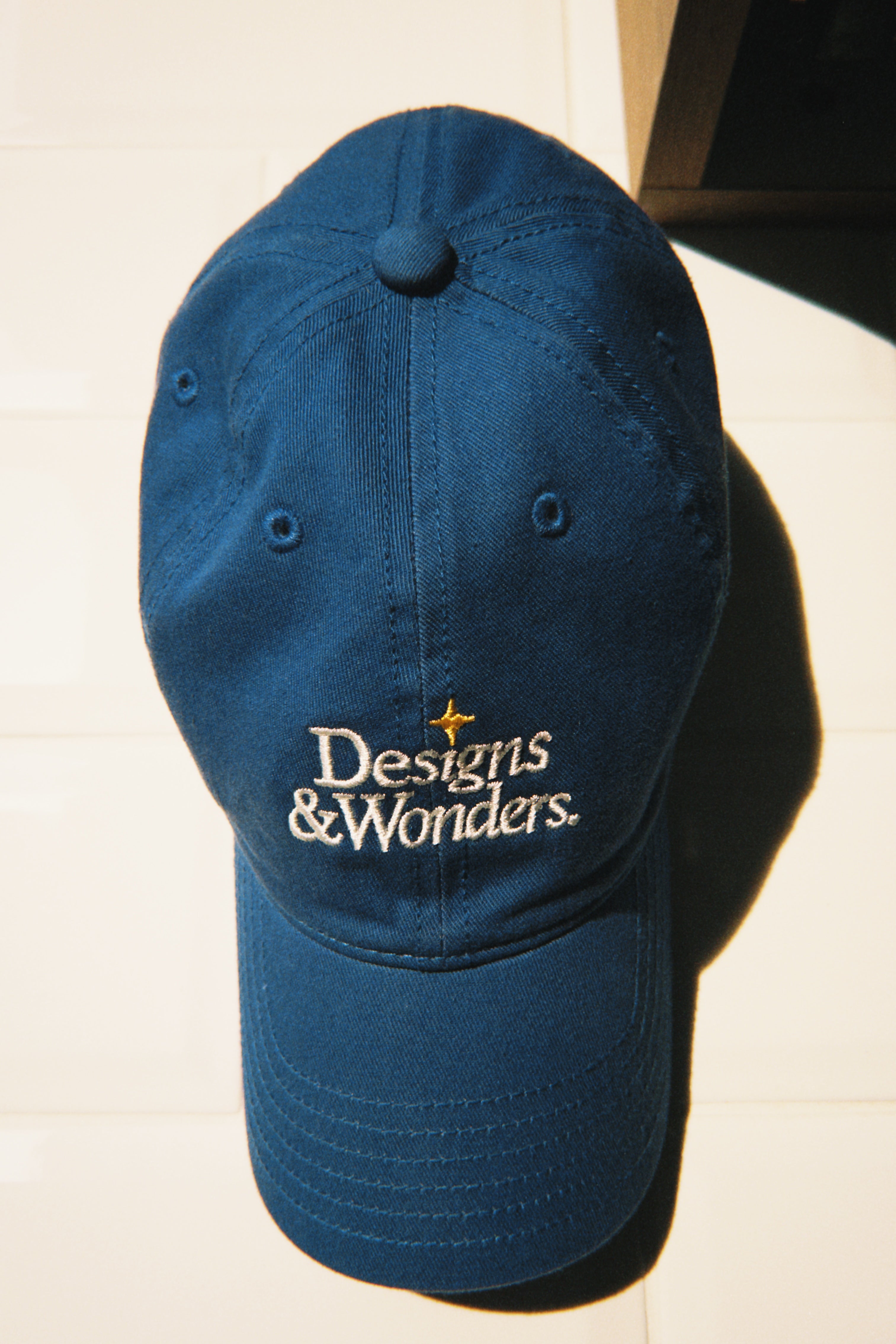 Designs & Wonders Cap: Blue